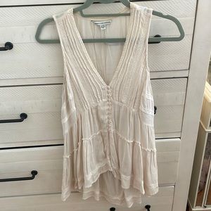 Flowy cream colored tank top with buttons
